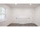 Bright bedroom with hardwood floors, fireplace and window at 615 English St, Monroe, NC 28110