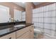 Bathroom with granite countertop, single sink, and shower/tub combo at 124 Streamwood Rd, Troutman, NC 28166