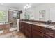 Primary bathroom with granite countertops, double sinks, and a large walk-in shower at 124 Streamwood Rd, Troutman, NC 28166
