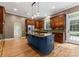 Eat-in kitchen with granite countertops, dark wood cabinets, and stainless steel appliances at 124 Streamwood Rd, Troutman, NC 28166