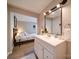 Modern bathroom with a double vanity and large mirror at 332 Lyle St, Rock Hill, SC 29730