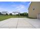 Spacious backyard with a basketball court and a fence at 5601 Ballenger Ct, Waxhaw, NC 28173