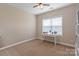Bright bedroom with window, desk, and carpeted floor at 5601 Ballenger Ct, Waxhaw, NC 28173