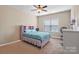 Bedroom with a pink bed frame and window at 5601 Ballenger Ct, Waxhaw, NC 28173