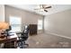 Home office with desk, chair, and window at 5601 Ballenger Ct, Waxhaw, NC 28173