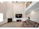 Large living room boasts a fireplace and a wall-mounted TV at 5601 Ballenger Ct, Waxhaw, NC 28173