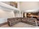 Spacious living room with a sectional sofa and high ceilings at 5601 Ballenger Ct, Waxhaw, NC 28173
