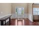 Bright and spacious entryway with hardwood floors and a console table at 5601 Ballenger Ct, Waxhaw, NC 28173