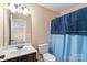 Clean bathroom with shower/tub combo, vanity, and toilet at 5601 Ballenger Ct, Waxhaw, NC 28173