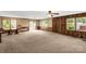 Bright living room with wood paneling and access to outdoor space at 2017 And 2025 Filbert Hwy, York, SC 29745