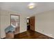 Bedroom with hardwood floors and access to a back porch at 2017 And 2025 Filbert Hwy, York, SC 29745