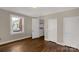 Bedroom with hardwood floors and laundry closet access at 2017 And 2025 Filbert Hwy, York, SC 29745