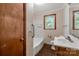 Bathroom with tub, sink, and wood vanity at 2017 And 2025 Filbert Hwy, York, SC 29745