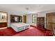 Main bedroom with red carpet and ample closet space at 2017 And 2025 Filbert Hwy, York, SC 29745