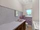 Bathroom with pink tile, sink, and bathtub at 2017 And 2025 Filbert Hwy, York, SC 29745