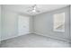 Bright bedroom with ceiling fan and carpeting at 14303 Evening Flight Ln, Charlotte, NC 28262