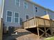 Back exterior with wooden deck and AC unit at 2761 Ruby Mill Dr, Gastonia, NC 28056