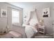 Charming bedroom with canopy bed and playful decor at 3038 Langhorne Sw Ave # 07, Concord, NC 28027