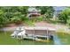 Covered boat dock with jet skis on a lake at 2580 Penngate Dr, Sherrills Ford, NC 28673