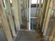 Plumbing rough-in stage in a new home, showing pipes and drains installed at 700 Bellegray Rd # 4, Clover, SC 29710