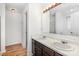 Bathroom with double vanity and hardwood floor at 8310 Wallace Glen Dr, Charlotte, NC 28212