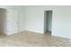 Bright bedroom with light wood-look flooring and a closet at 830 Oakshire Cir, Charlotte, NC 28214