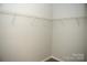 Walk-in closet with wire shelving, offering ample storage space at 1327 Phil Oneil Dr, Charlotte, NC 28215