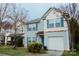 Two story home with gray siding and teal accents at 1327 Phil Oneil Dr, Charlotte, NC 28215