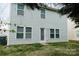 Rear view of two story home with gray siding at 1327 Phil Oneil Dr, Charlotte, NC 28215