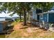 Lakefront lot with retaining wall and lush landscaping at 50444 Haven Bend Rd, Albemarle, NC 28001