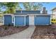Blue house with stone accents and a walkway at 50444 Haven Bend Rd, Albemarle, NC 28001