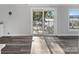 Dining area with sliding glass doors leading to a deck overlooking the lake at 50444 Haven Bend Rd, Albemarle, NC 28001