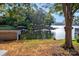 Peaceful lakefront view with private dock and lush trees at 50444 Haven Bend Rd, Albemarle, NC 28001