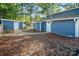 Blue home with detached garage and walkway at 50444 Haven Bend Rd, Albemarle, NC 28001