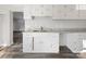 Simple white kitchen featuring granite countertops and ample cabinet space at 50444 Haven Bend Rd, Albemarle, NC 28001