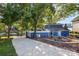 Lakefront home with a long driveway and landscaping at 50444 Haven Bend Rd, Albemarle, NC 28001