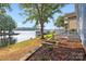 Serene backyard oasis with lake view and deck at 50444 Haven Bend Rd, Albemarle, NC 28001
