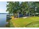Lakefront property with boat dock and spacious yard at 50444 Haven Bend Rd, Albemarle, NC 28001