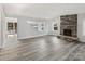 Finished basement boasts a stone fireplace and access to a deck overlooking the water at 50444 Haven Bend Rd, Albemarle, NC 28001