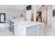 Large kitchen island with white marble countertop and stainless steel appliances at 323 Atherton St, Charlotte, NC 28203