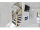 Modern staircase with sleek metal and wood accents at 323 Atherton St, Charlotte, NC 28203