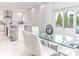 Modern white kitchen with stainless steel appliances and an island at 323 Atherton St, Charlotte, NC 28203