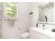 Clean bathroom with modern vanity, toilet, and shower at 323 Atherton St, Charlotte, NC 28203