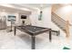 Finished basement with pool table, bar area, and stylish decor at 323 Atherton St, Charlotte, NC 28203