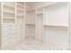 Large walk-in closet with ample shelving and hanging space at 323 Atherton St, Charlotte, NC 28203