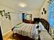 Bedroom with hardwood floors, a dresser, and a large bed at 836 S Cherry Rd, Rock Hill, SC 29732