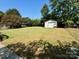 Large backyard with shed and basketball hoop at 836 S Cherry Rd, Rock Hill, SC 29732