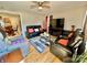 Living room with hardwood floors, comfy seating and a TV at 836 S Cherry Rd, Rock Hill, SC 29732