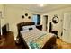 Bedroom featuring a king-size bed and hardwood floors at 836 S Cherry Rd, Rock Hill, SC 29732