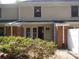 Private patio and fenced backyard with landscaping at 7118 Quail Meadow Ln, Charlotte, NC 28210